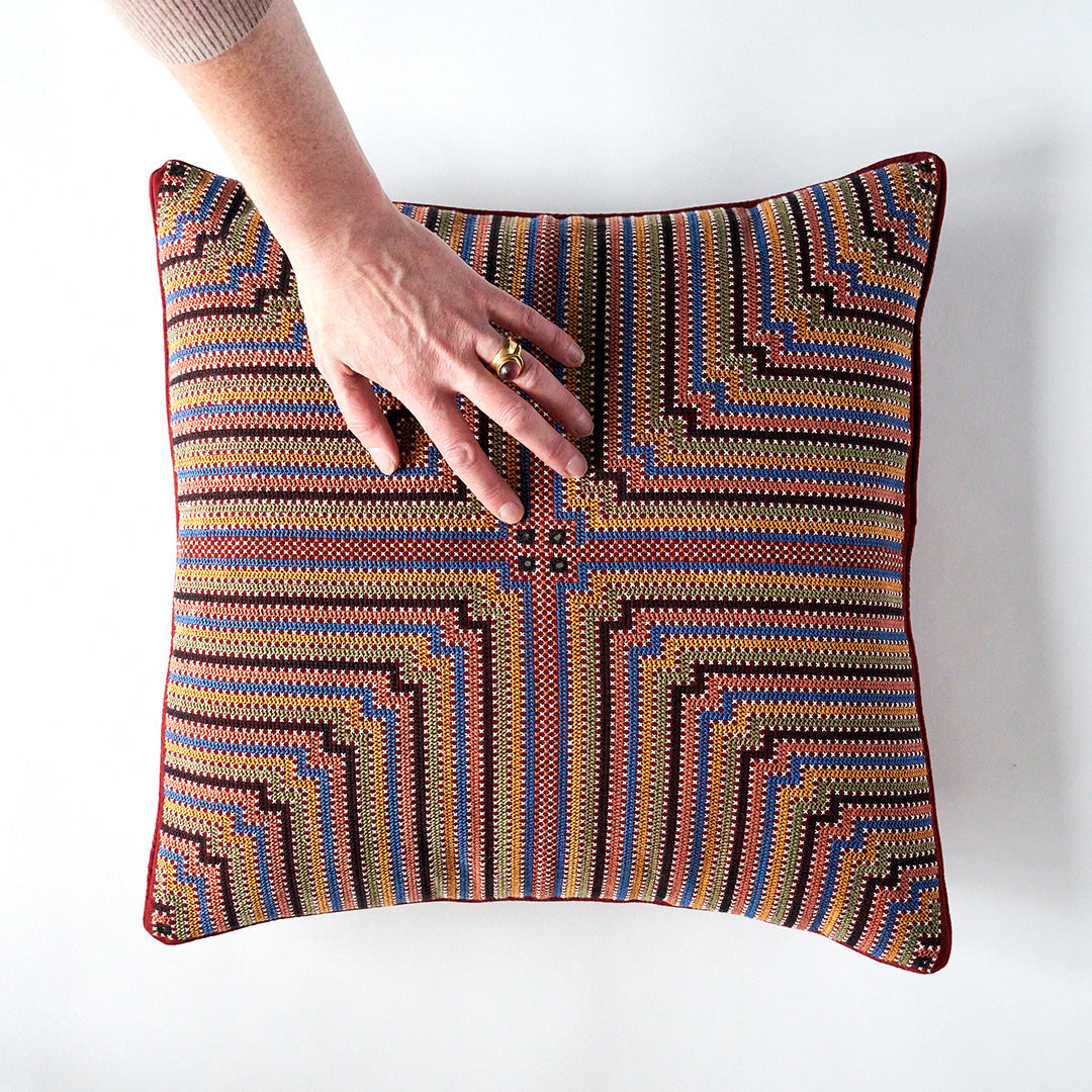 Kala Rama, Cross Stitches on Brick Red Cotton