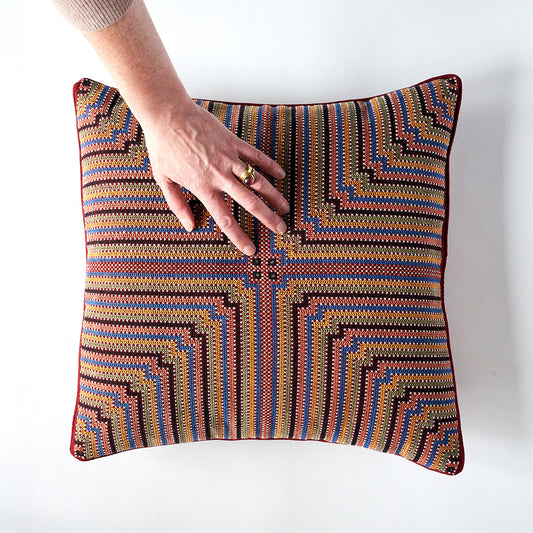 Kala Rama, Cross Stitches on Brick Red Cotton