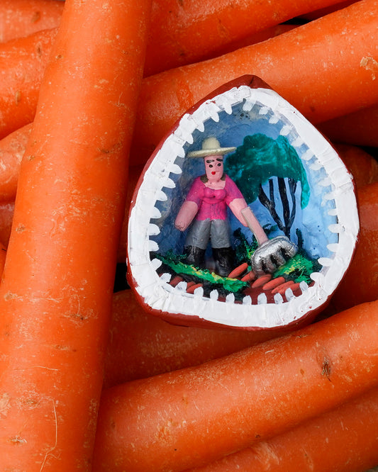 Gardening in the Carrot plot - inside a Walnut
